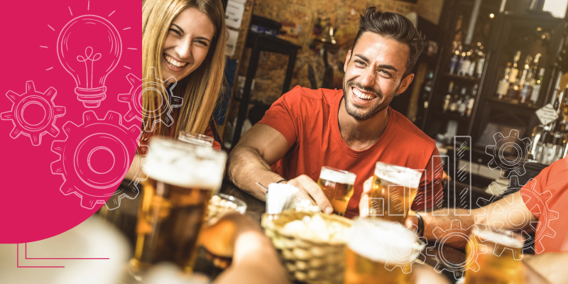 Amigos bebendo cerveja em um bar