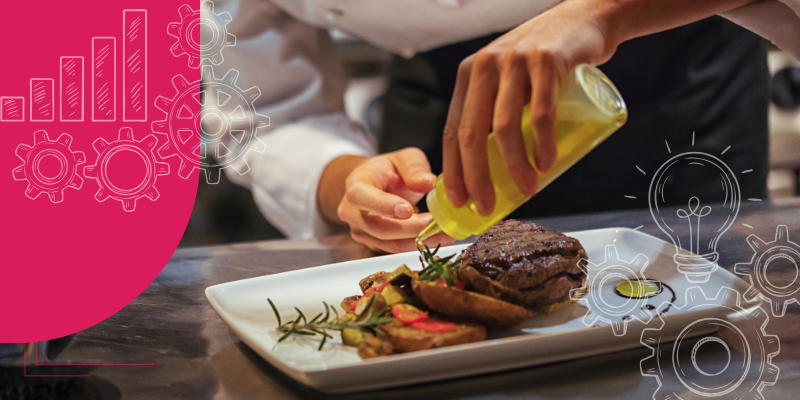 Um chef feliz apresentando prato surpresa no ambiente elegante de um restaurante, simbolizando táticas para encantar clientes na gastronomia.