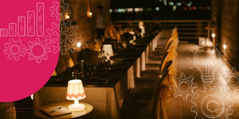 imagem de um restaurante confortável, acolhedor intimista com luzes baixas e