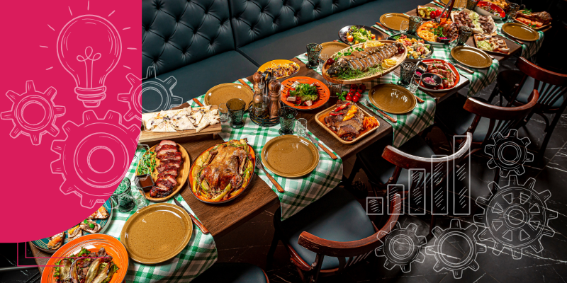 Mesa de restaurante com pratos, tablet mostrando descontos, balões pretos e faixas de promoção Black Friday.